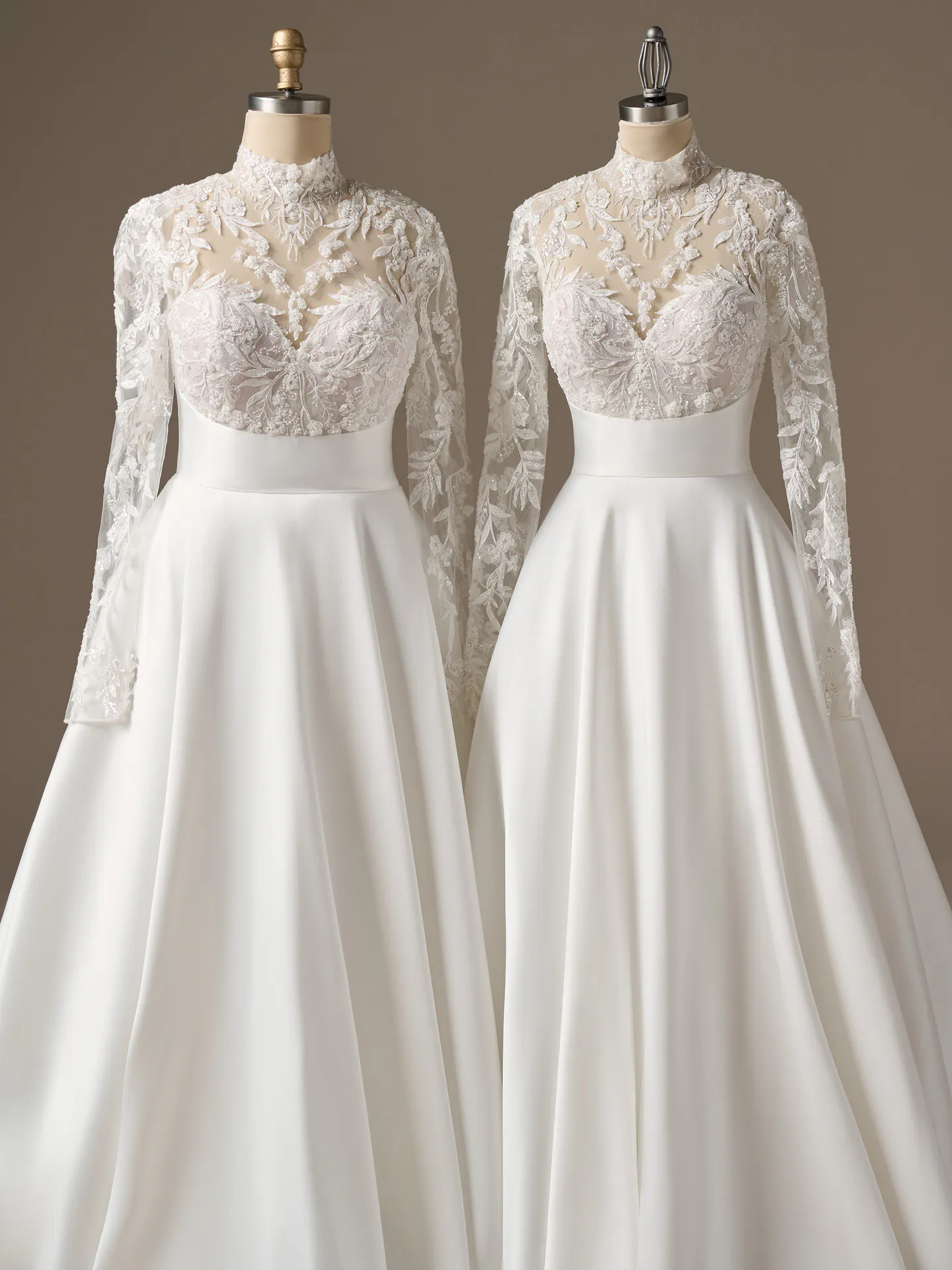Maggie Sottero Trinity, mock neck A-line dress displayed on mannequins.