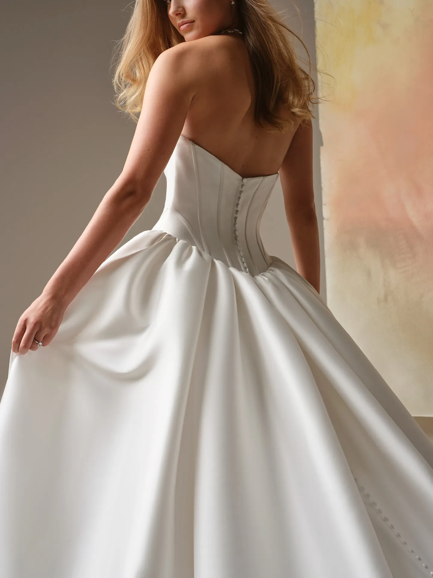 Maggie Sottero Yuma ballgown, back view, strapless satin with button detail, Maggie Sottero.
