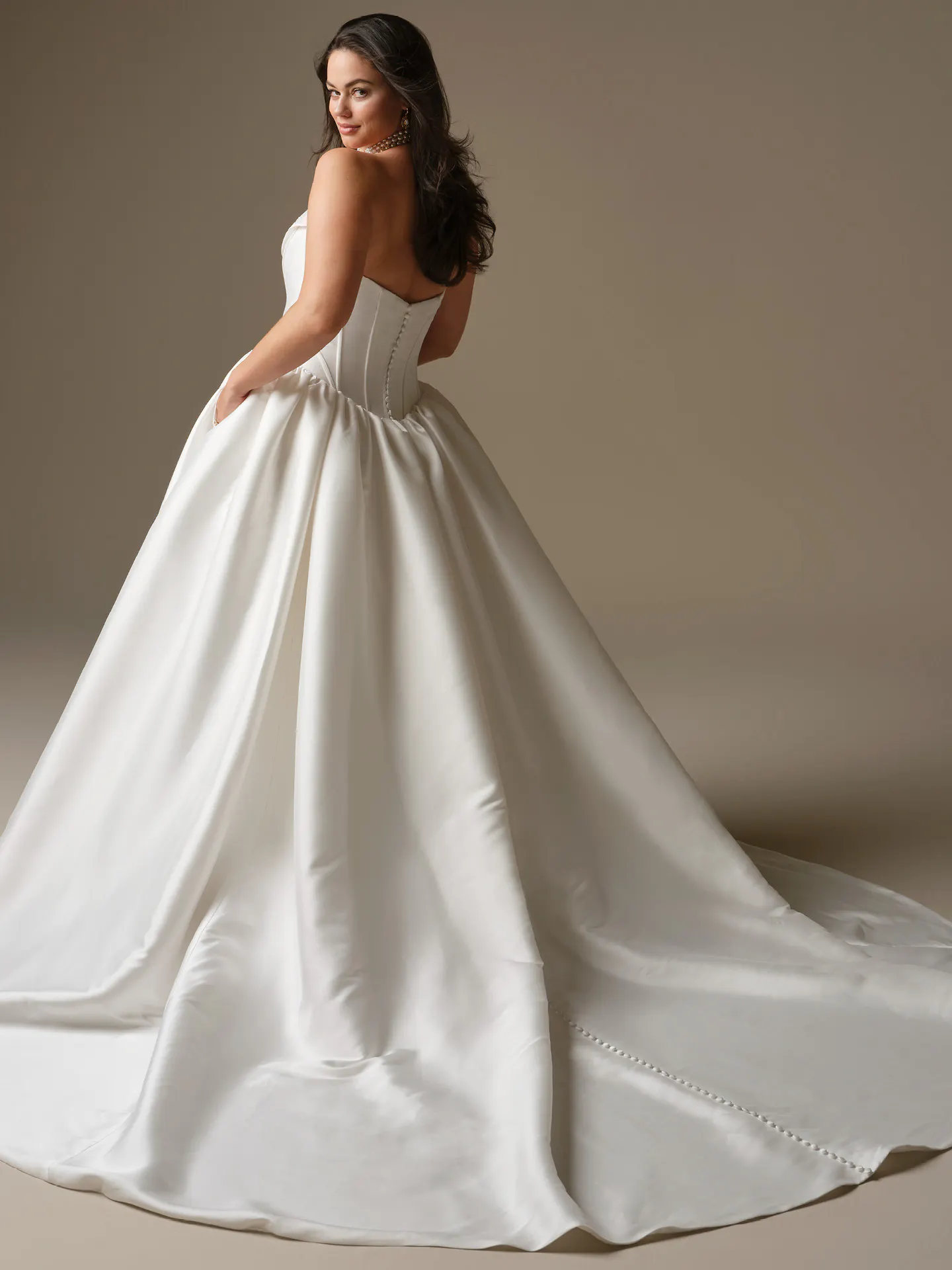 Maggie Sottero Yuma, back view ballgown with cowl neck and basque waist.