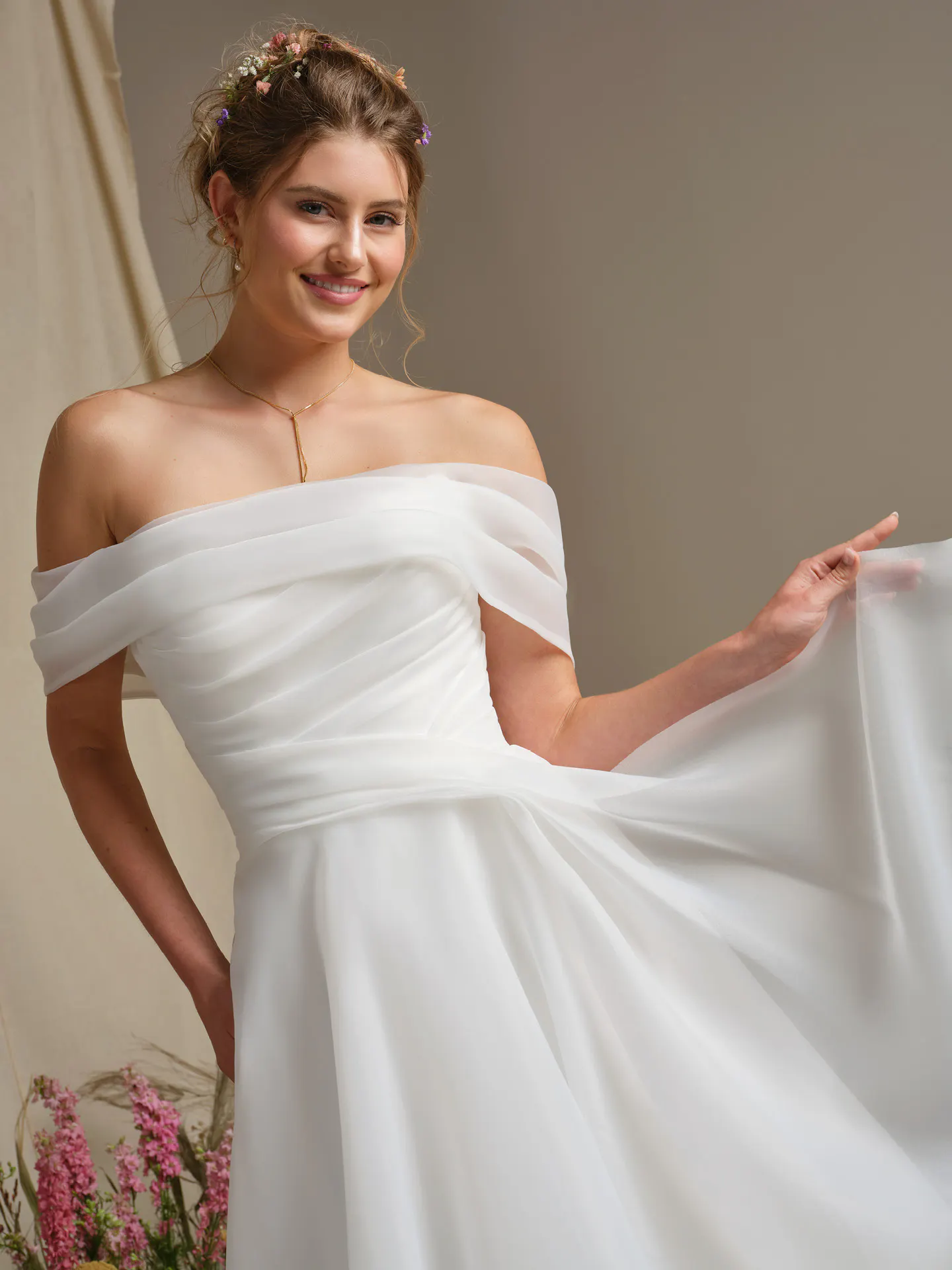 Rebecca Ingram Dezi, front view, cat eye neckline, pleated organza ballgown.