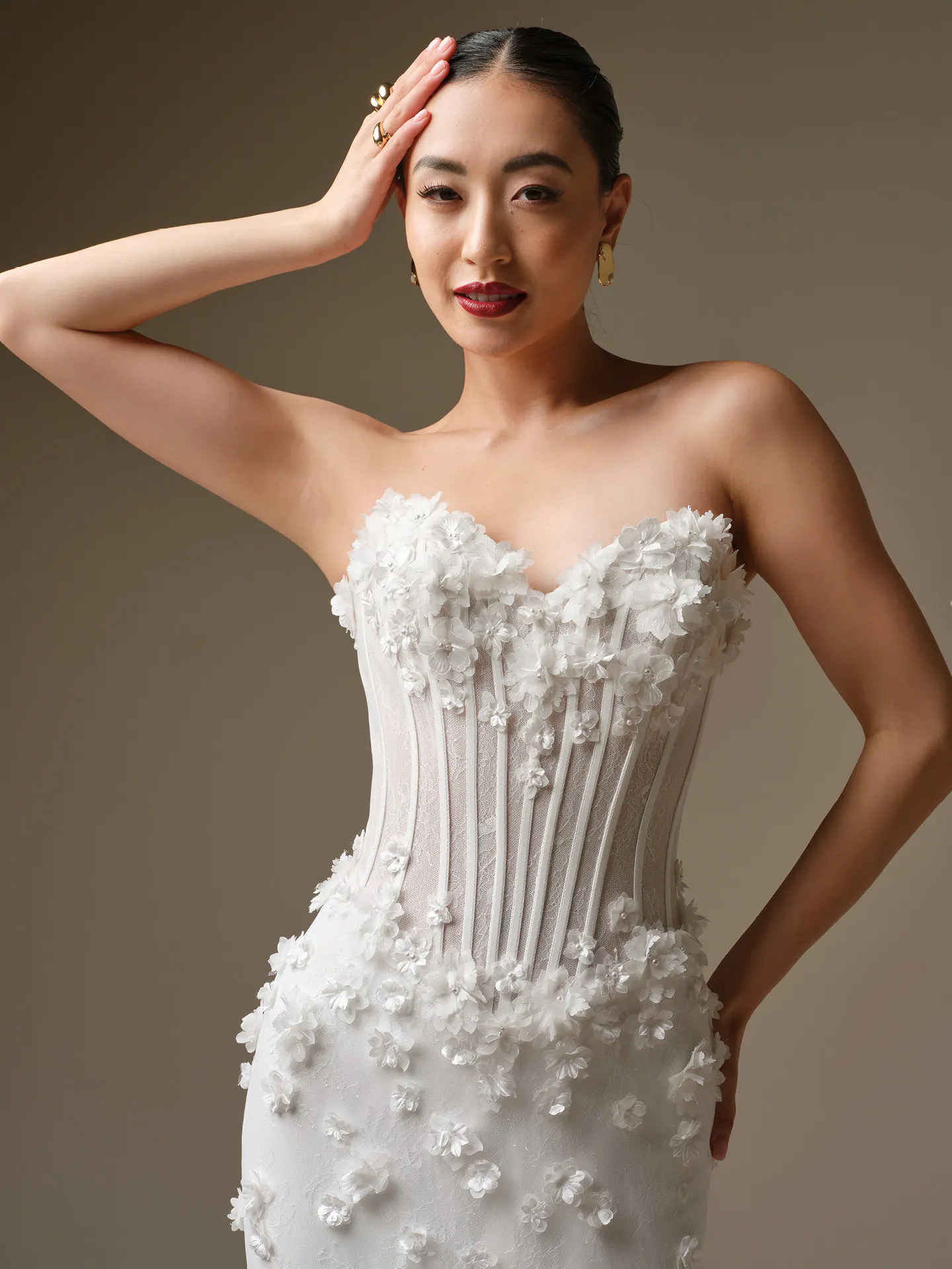 Maggie Sottero Akari fit-and-flare 3-D flower wedding dress front view.