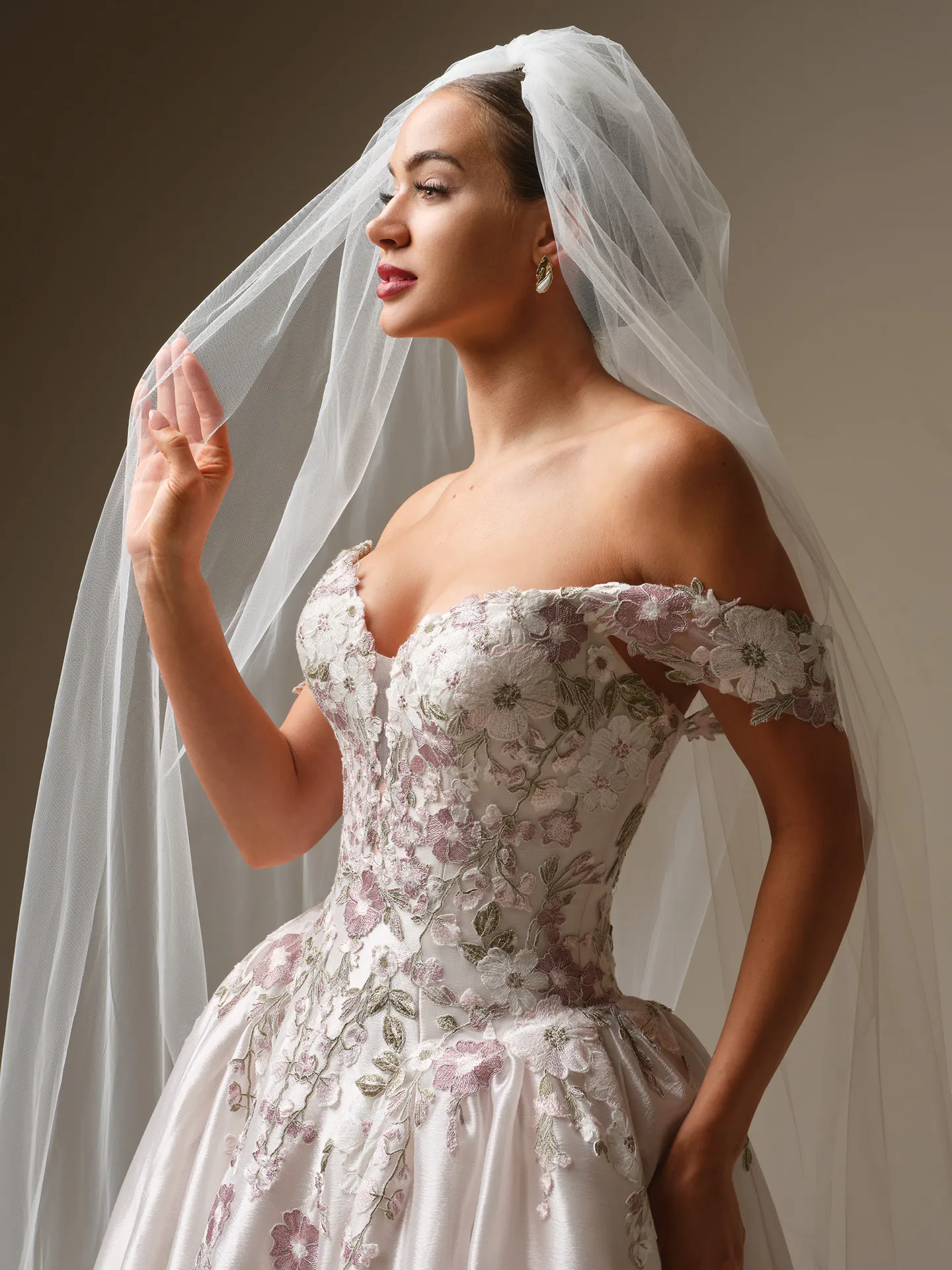 Maggie Sottero Alvarez floral lace ballgown, side view.