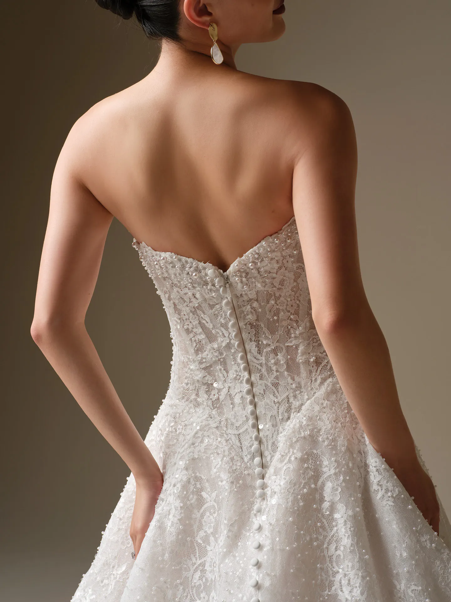 Maggie Sottero Angelica, back view beaded lace A-line wedding dress.