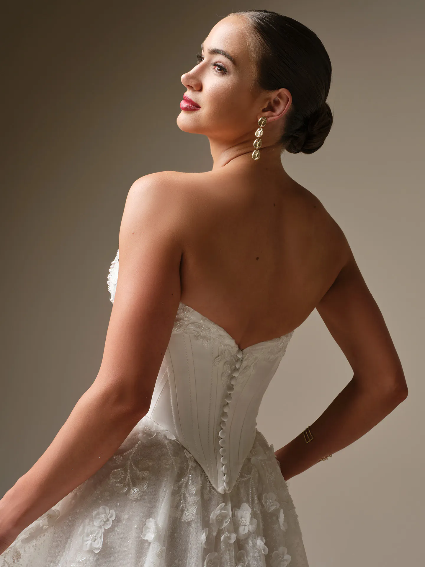 Sottero and Midgley Kalinda ballgown, back view with 3-D floral lace.