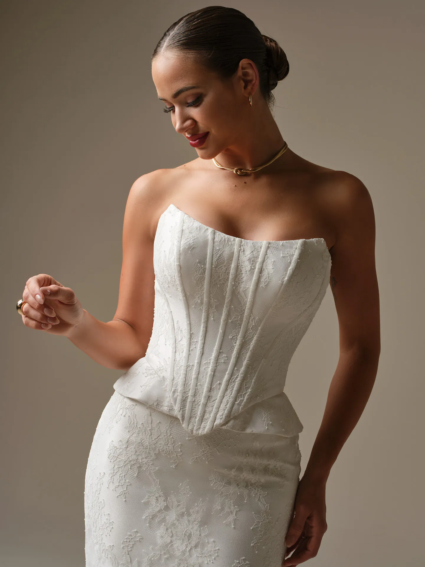 Sottero and Midgley Lassen strapless Chantilly lace sheath, front view.