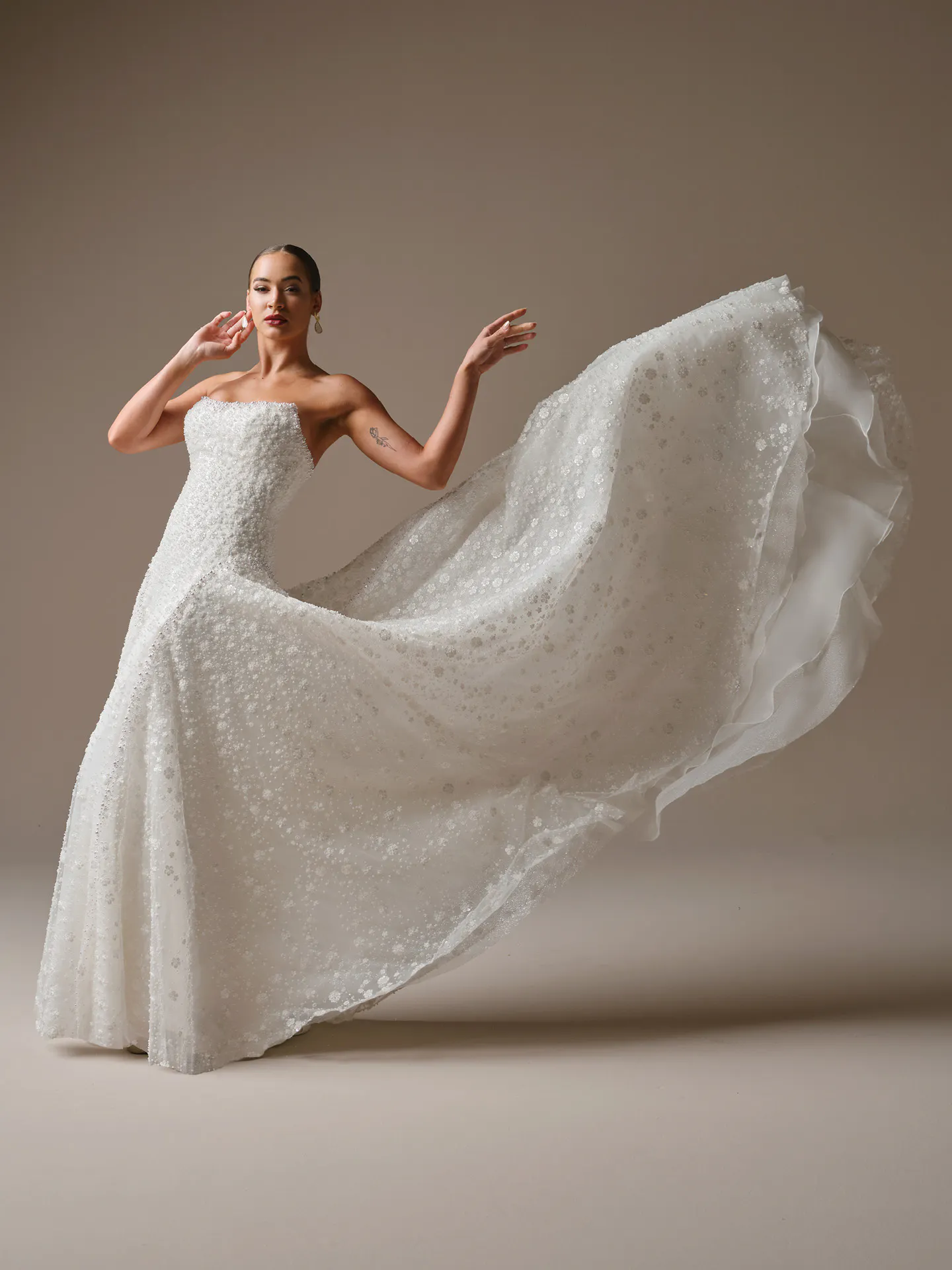 Sottero and Midgley Marceline A-line dress, front view flowing train.
