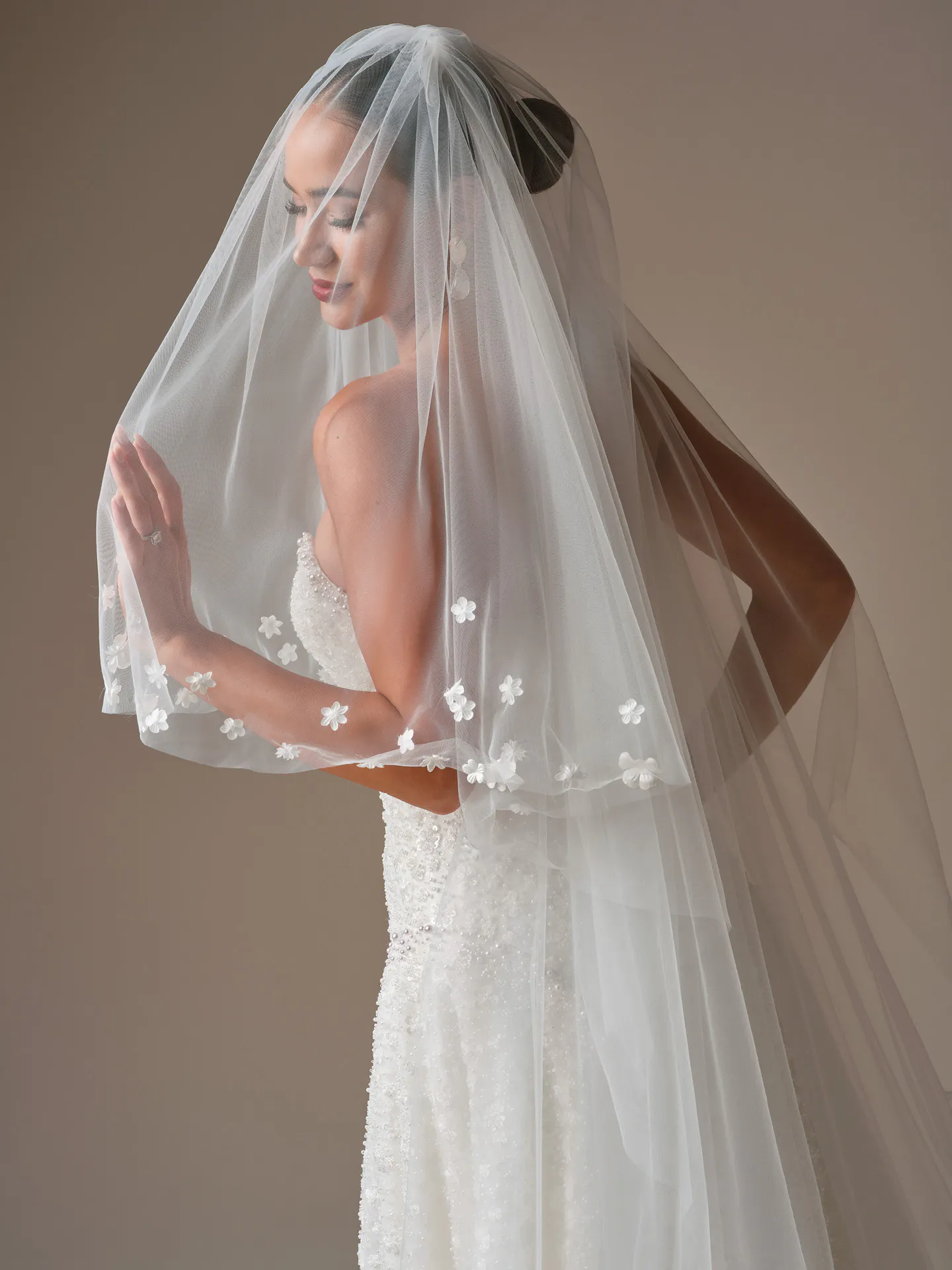 Sottero and Midgley Marceline, side view with floral veil.