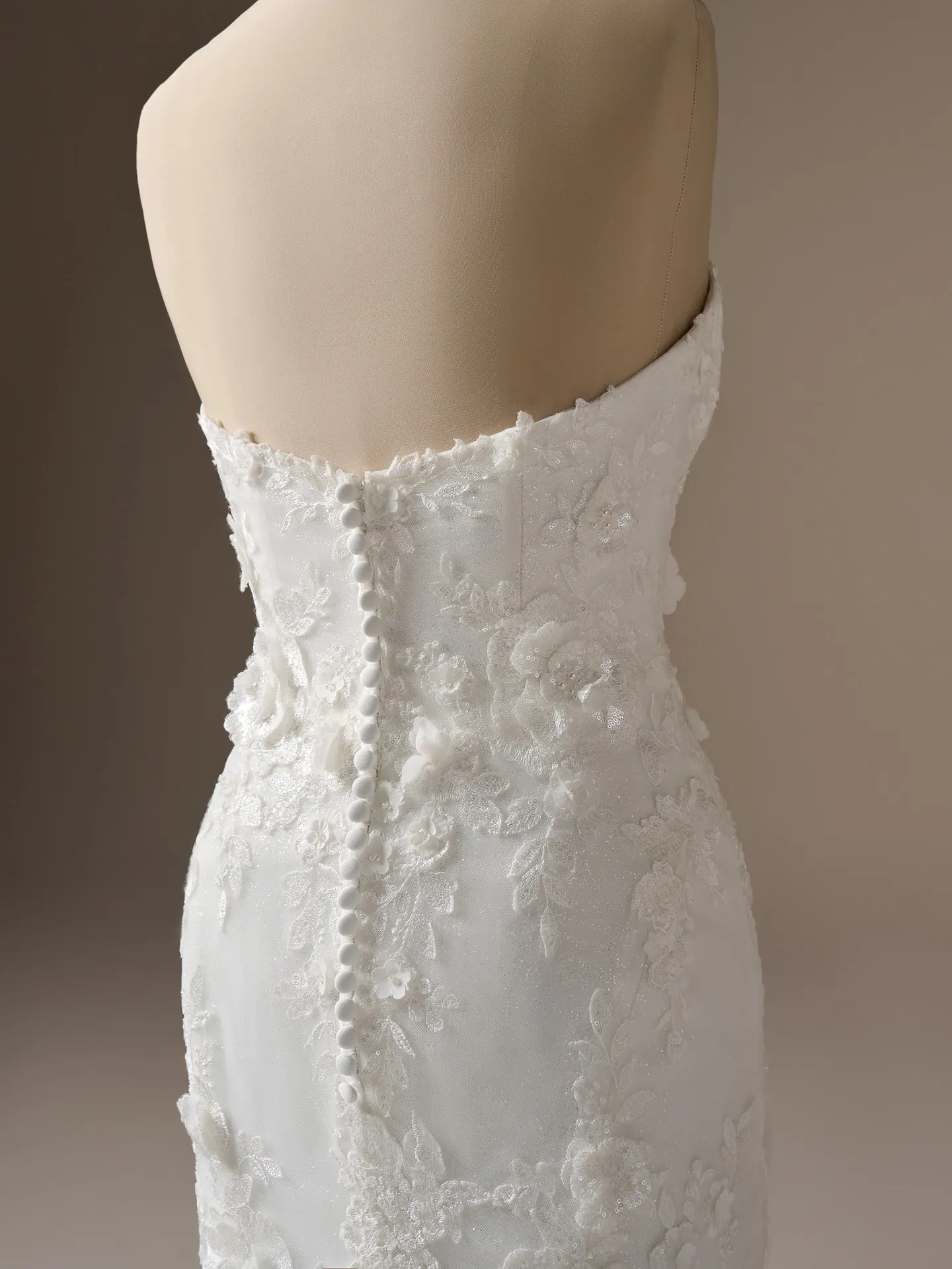 Sottero and Midgley Rashida, back view buttoned beaded lace fit-and-flare wedding dress.