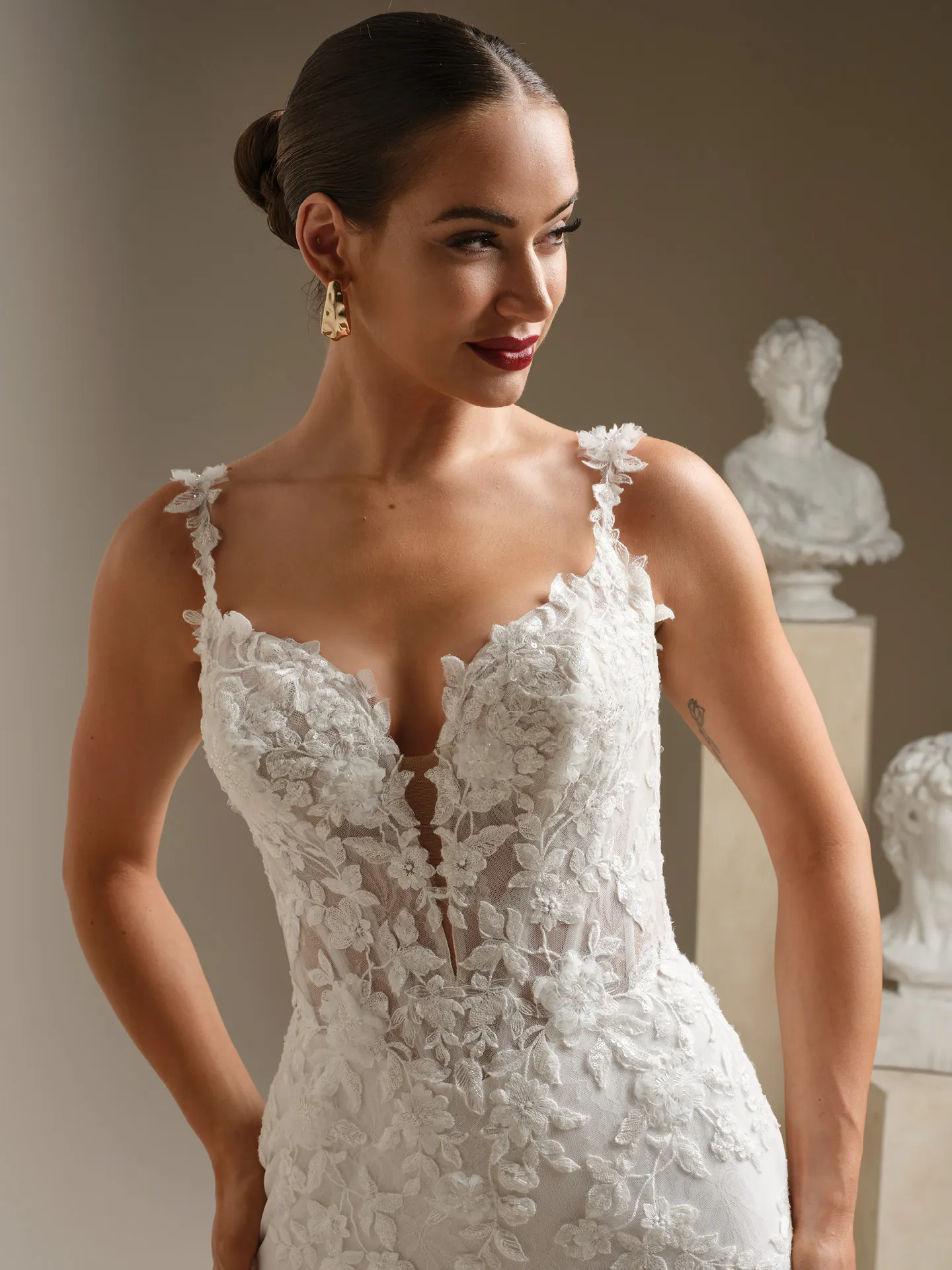 Sottero and Midgley West, front view beaded lace fit-and-flare wedding dress.
