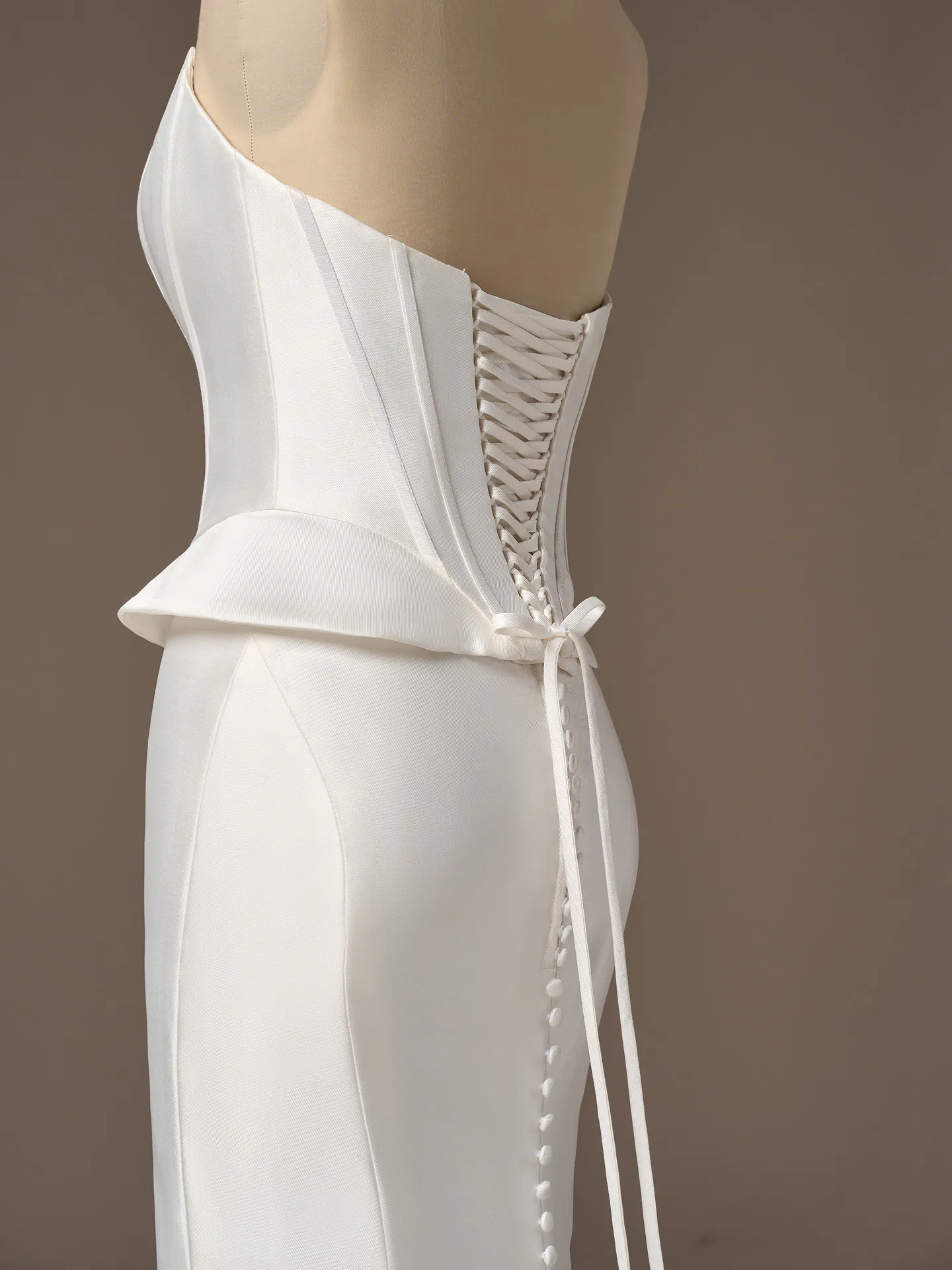 Sottero and Midgley Lassen, side view; strapless mikado corset sheath wedding dress.