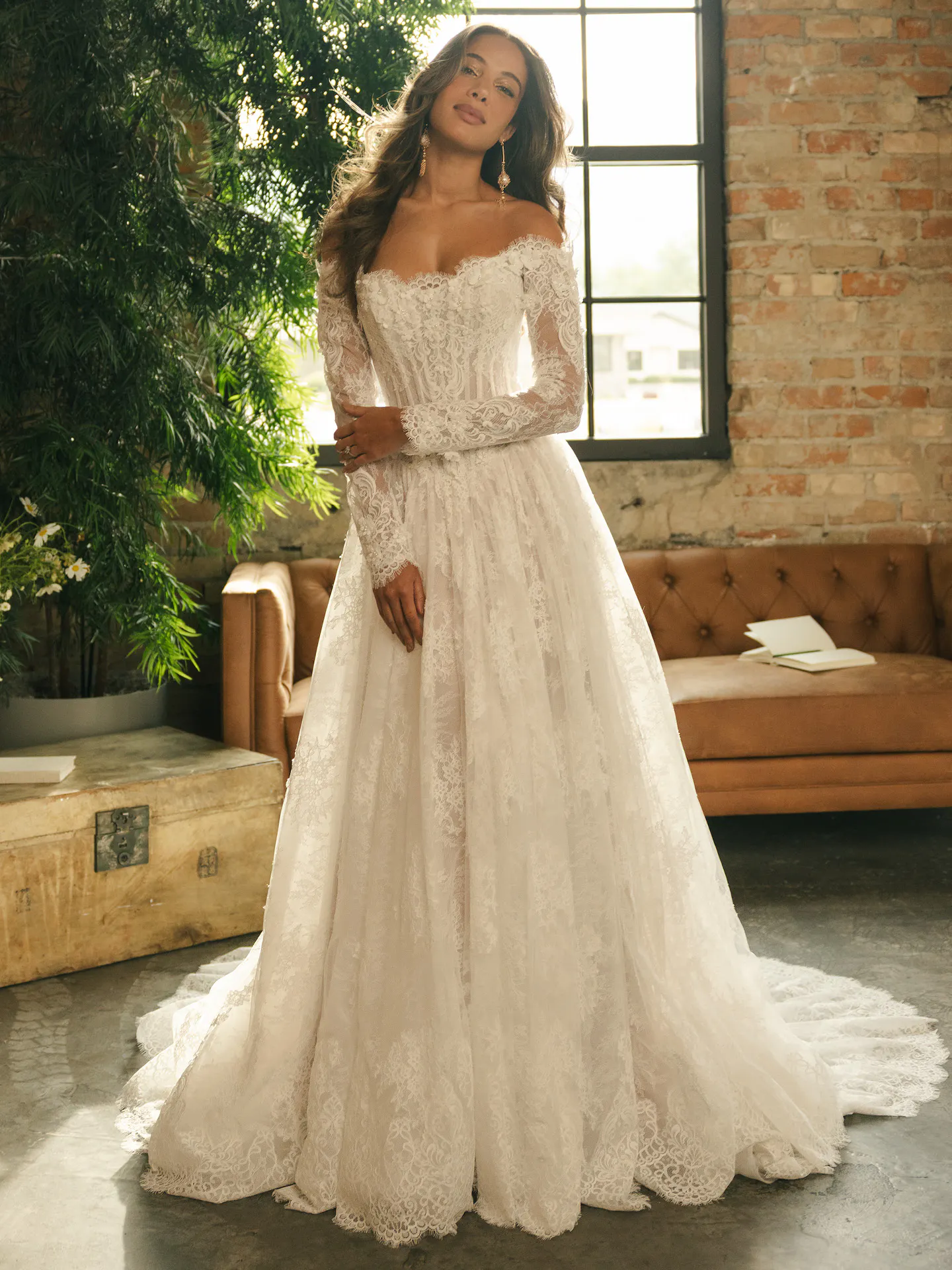 Maggie Sottero Kitaro, front view lace ballgown wedding dress in rustic setting.
