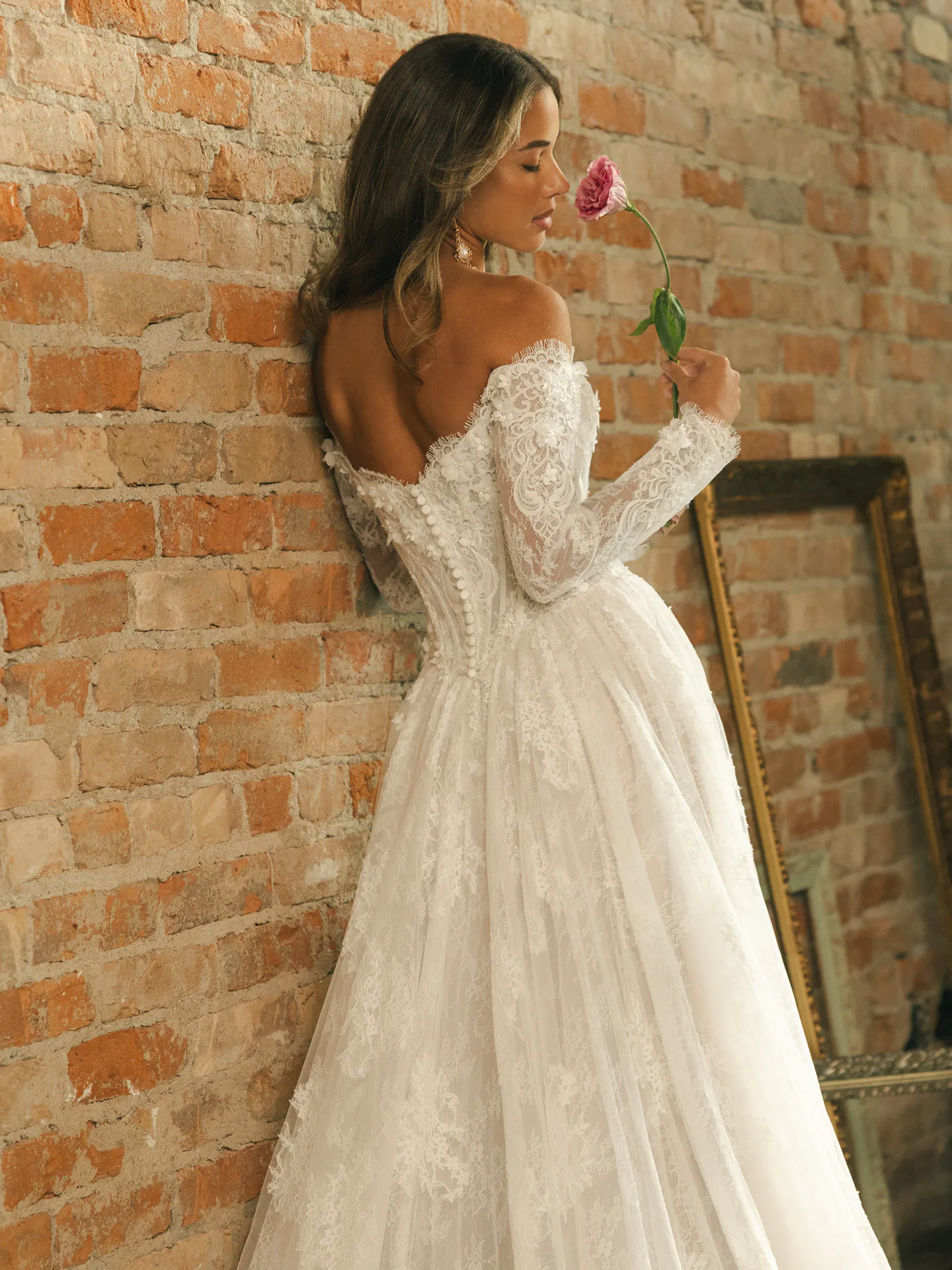Kitaro ballgown, back view with lace details Maggie Sottero.