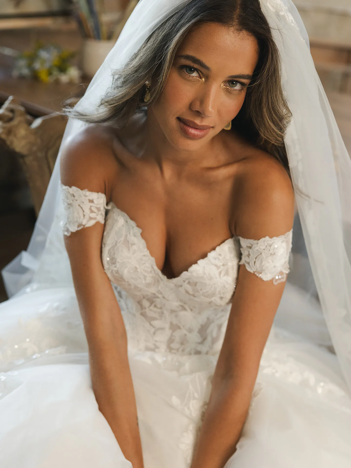 Maggie Sottero Verina lace off-shoulder A-line wedding dress front view.