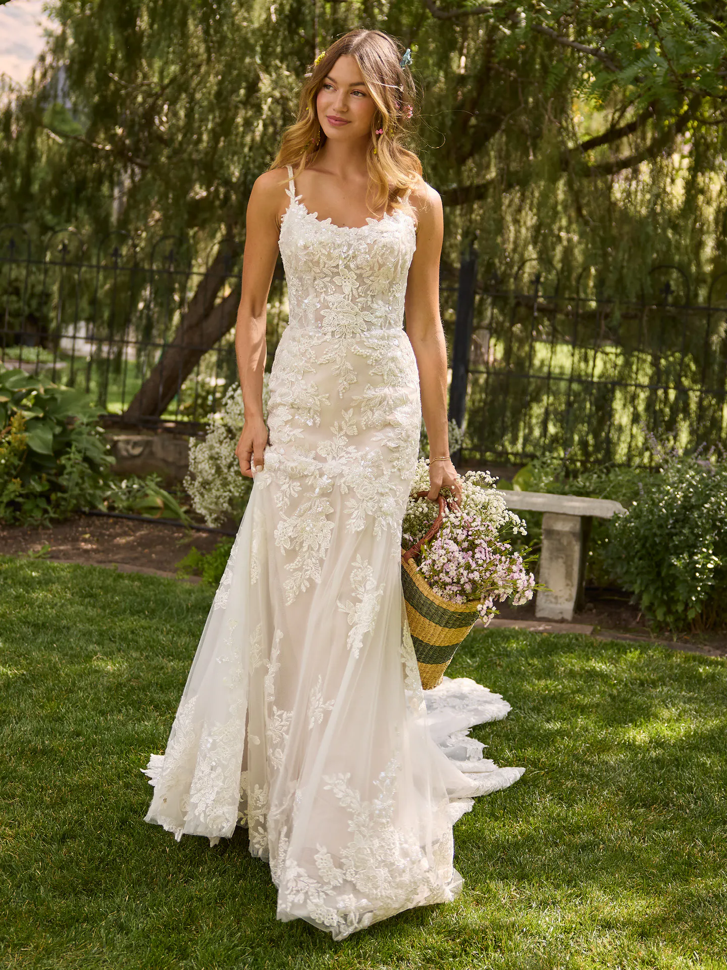 Rebecca Ingram Eden fit-and-flare dress, front view in garden setting.