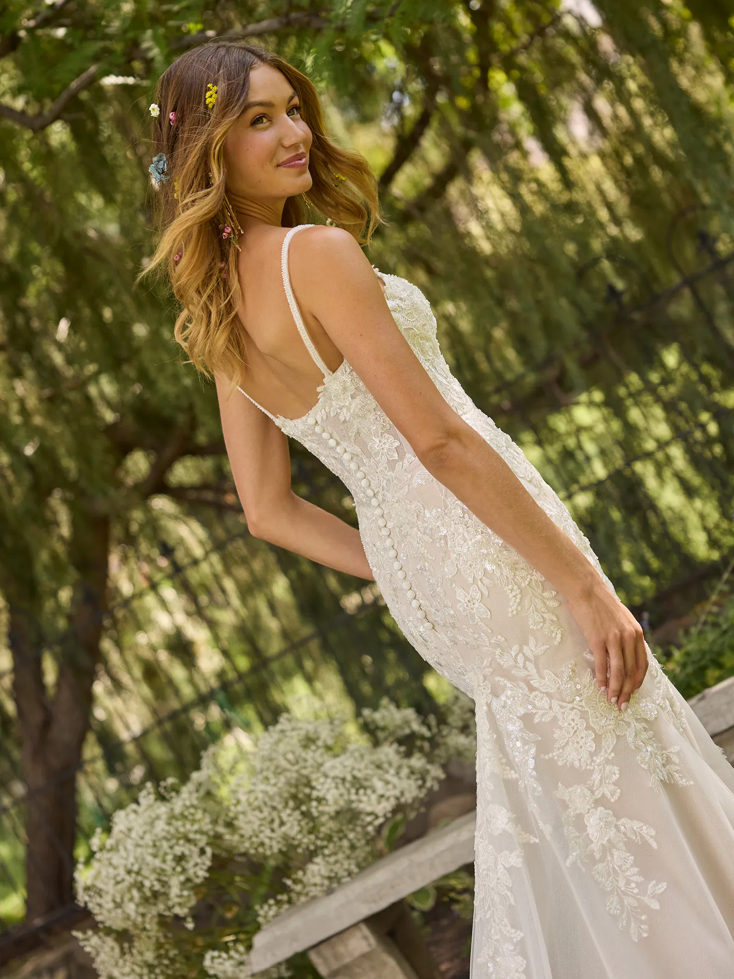 Rebecca Ingram Eden, back view outdoors.
