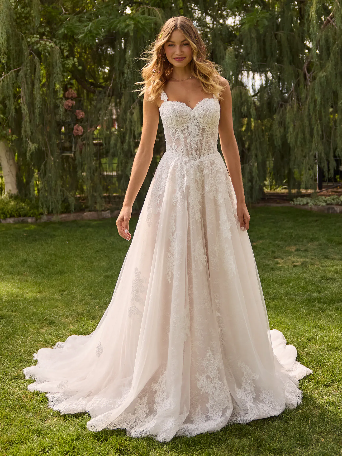 Rebecca Ingram Esmeralda front view lace a-line wedding dress outdoors