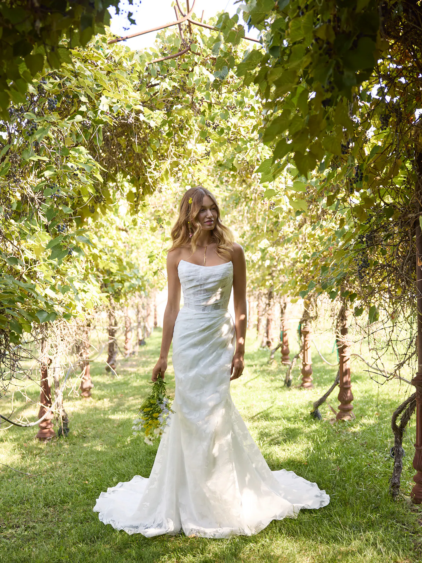 Rebecca Ingram Kendall organza sheath dress front view in lush vineyard setting