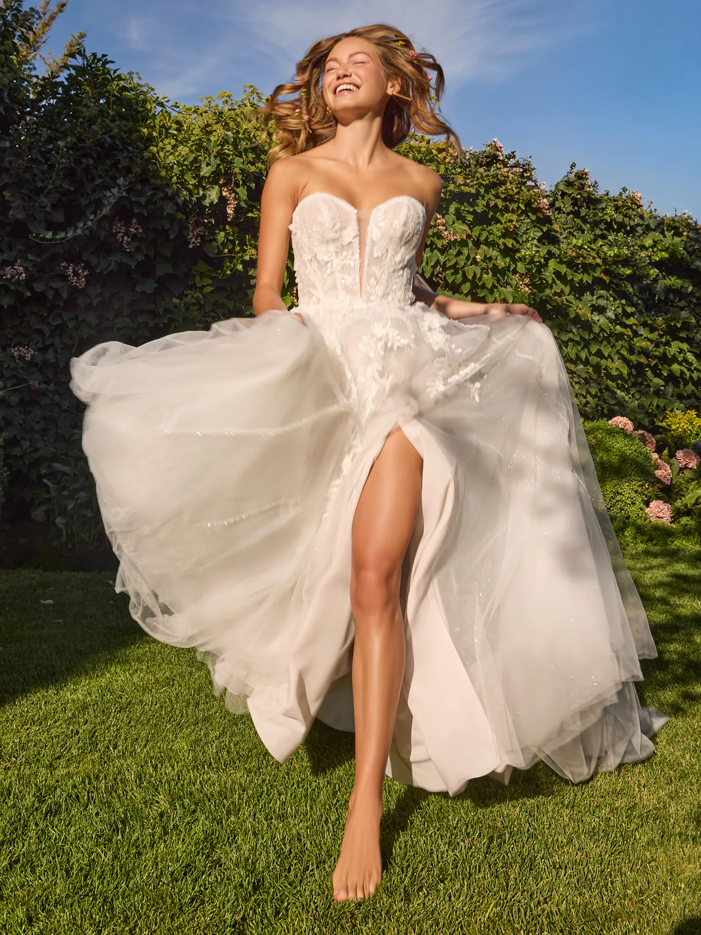 Rebecca Ingram Nora lace A-line wedding dress with side slit, front view
