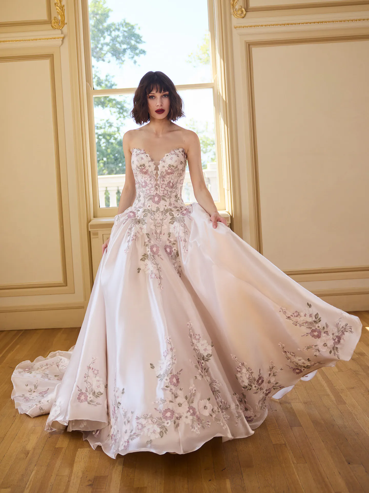 Maggie Sottero Alvarez ballgown, front view, floral lace detail, elegant setting.