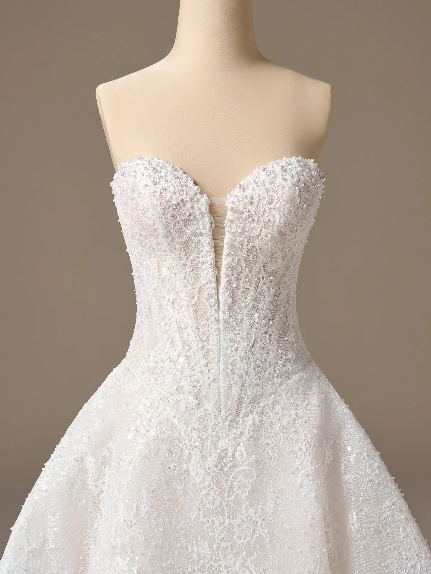 Maggie Sottero "Sottero and Midgley Angelica, front view A-Line beaded lace wedding dress".