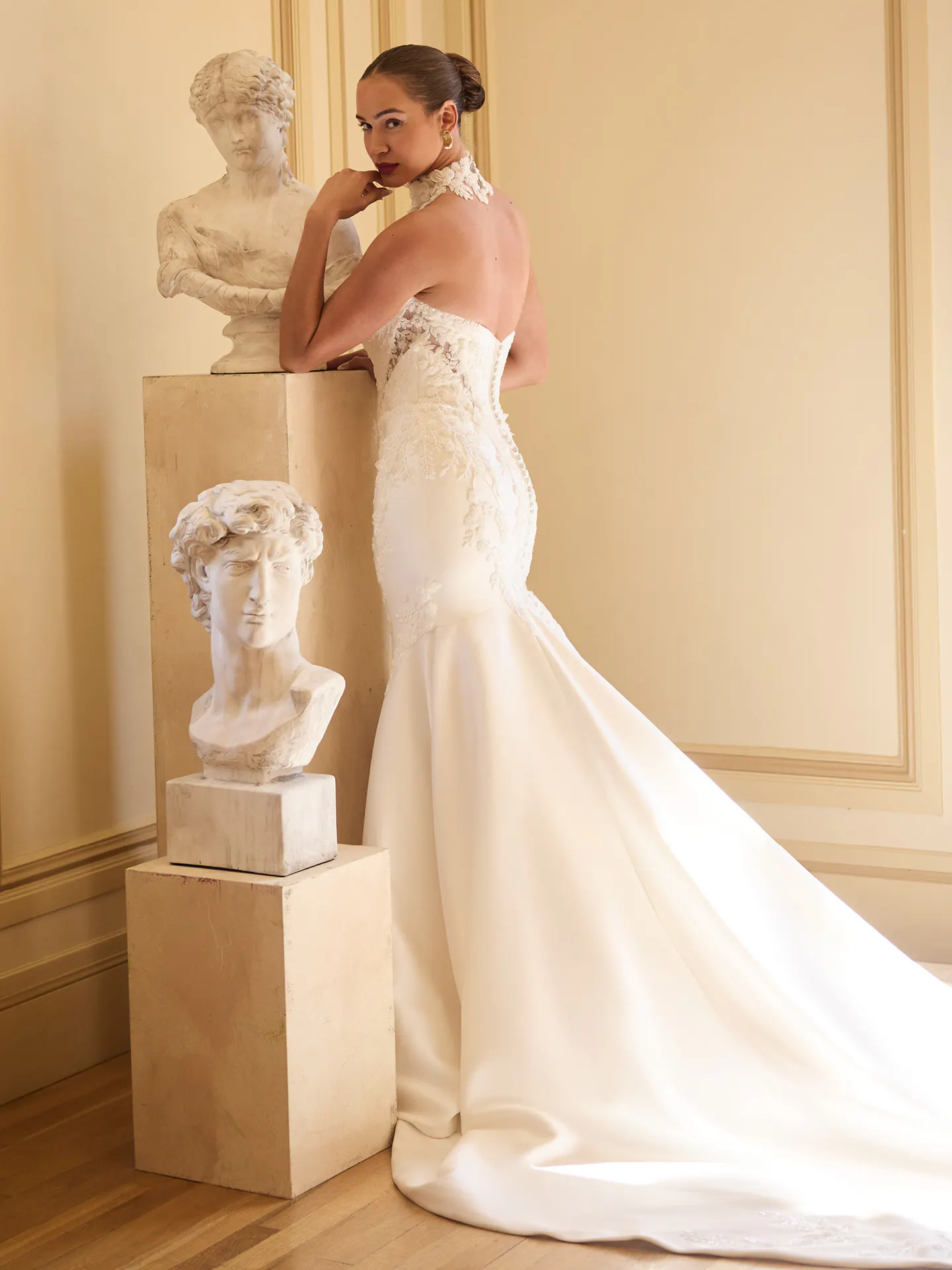 Maggie Sottero Burke, back view beaded lace fit-and-flare wedding dress.