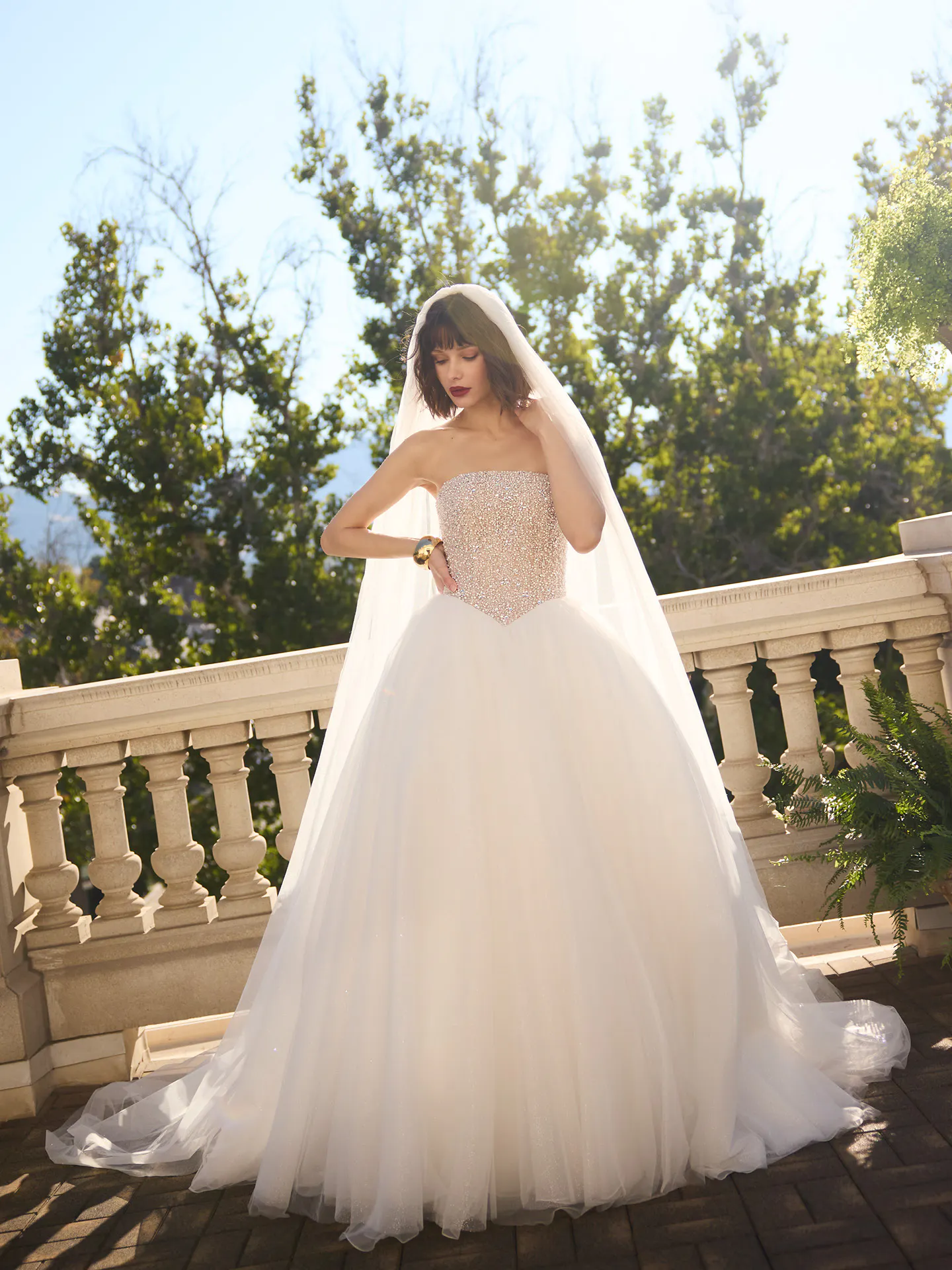 Sottero and Midgley Dmara Lane, front view, beaded tulle ballgown wedding dress, outdoor setting.