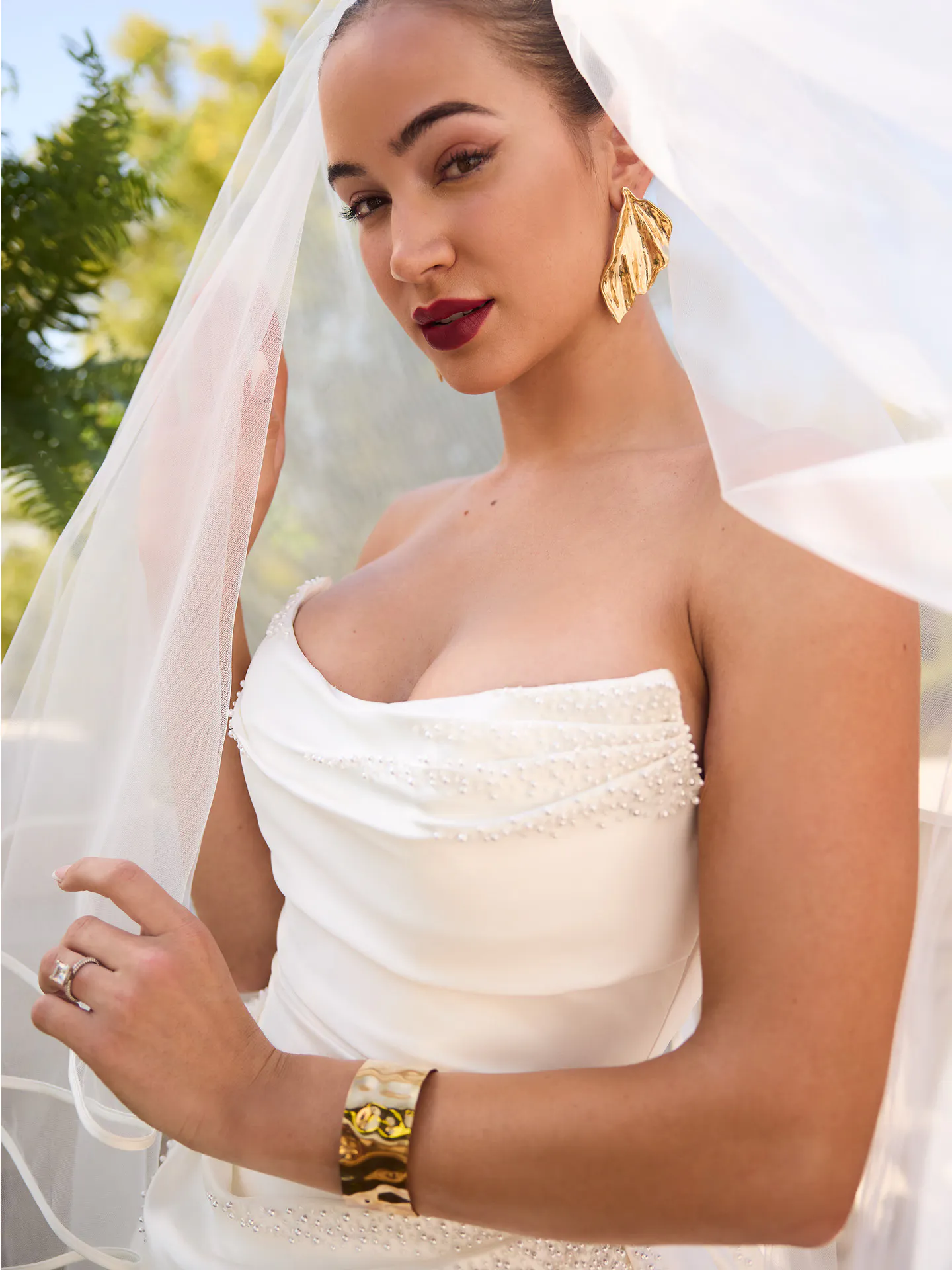 Sottero and Midgley Kincaid satin dress close-up with veil.