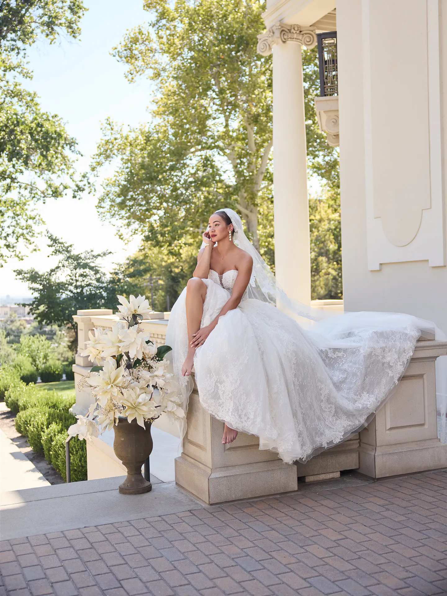 Sottero and Midgley Zulani strapless beaded ballgown wedding dress, front view outdoors.