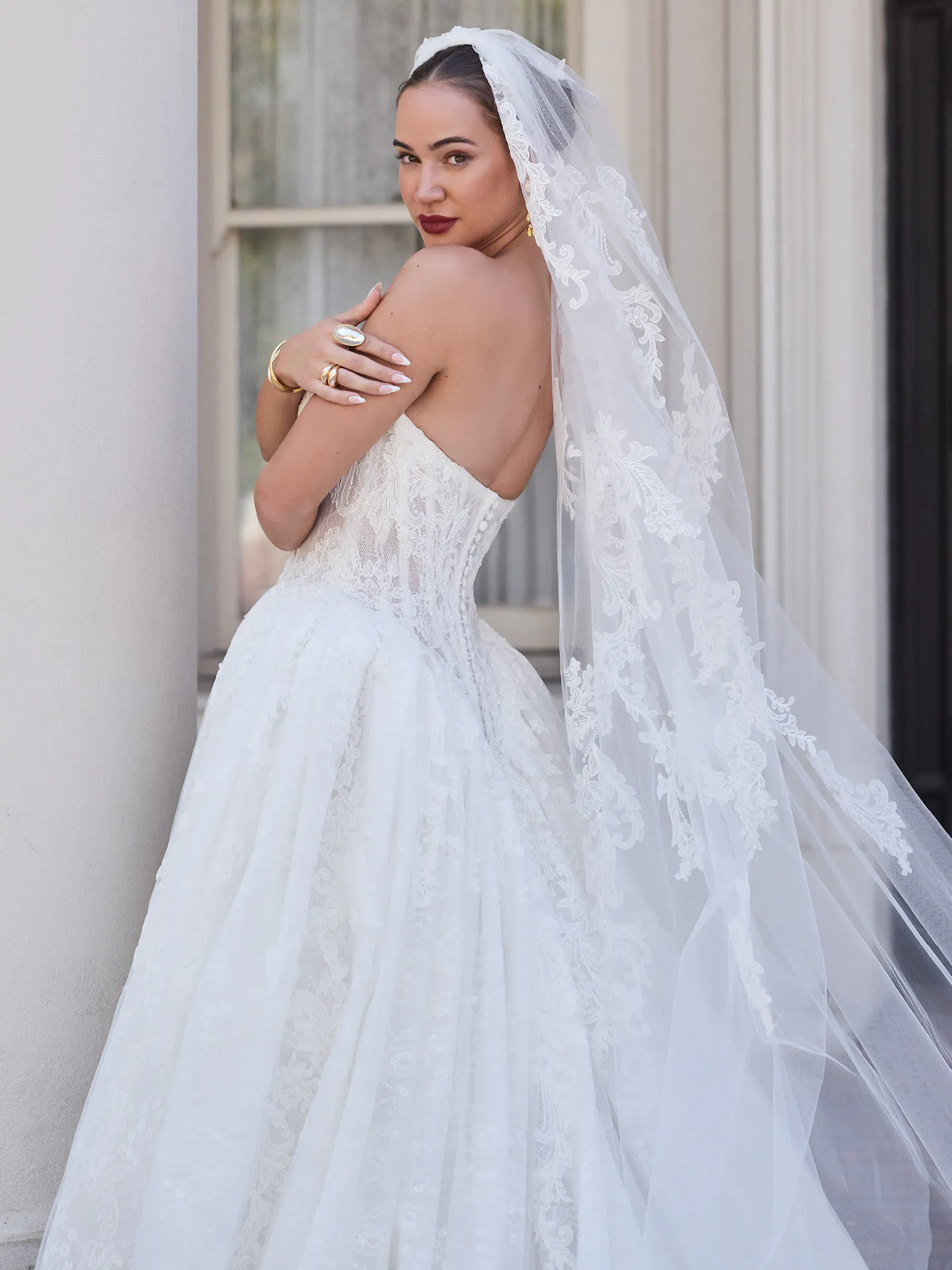 Sottero and Midgley Zulani, side view, strapless beaded lace corset ballgown.