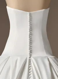 Maggie Sottero Adair, back view showing strapless satin ballgown with button detail.