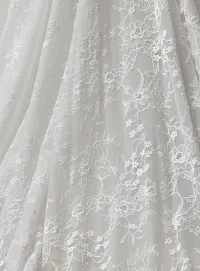Maggie Sottero Bellevue lace detail close-up.