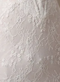 Maggie Sottero Bellevue close-up of strapless lace mermaid wedding dress detailing.