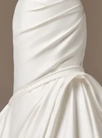 Maggie Sottero Emelina satin fit-and-flare wedding dress close-up view.