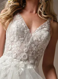 Rebecca Ingram Holly front view lace V-neck sheath wedding dress