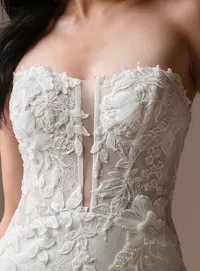 Maggie Sottero Laurie dress close-up lace bodice fit-and-flare style.