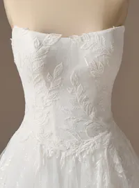 Rebecca Ingram Lisa front view lace ballgown wedding dress detailed with floral patterns