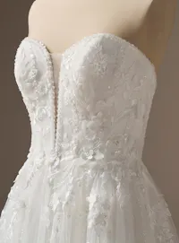 Rebecca Ingram Nora front view -D lace A-line wedding dress with plunge and floral details