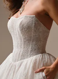 Maggie Sottero Raquel Chantilly lace ballgown, front view close-up.