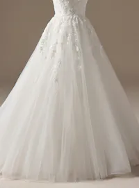 Rebecca Ingram Susan ballgown front view with illusion bodice and floral details