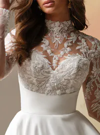 Maggie Sottero Trinity, front view lace mock neck A-line wedding dress.
