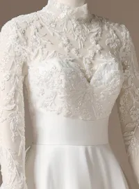 Maggie Sottero Trinity A-Line front with mock neck and lace details.