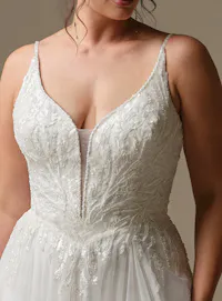 Rebecca Ingram Valarie front view, lace detail on plunging V-neck A-line wedding dress