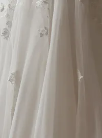 Maggie Sottero Verina lace details on A-Line wedding dress fabric.