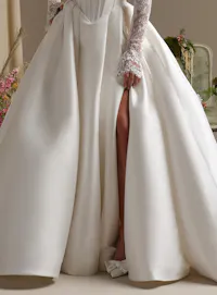 Rebecca Ingram Zorina ballgown front view with side slit and lace sleeves