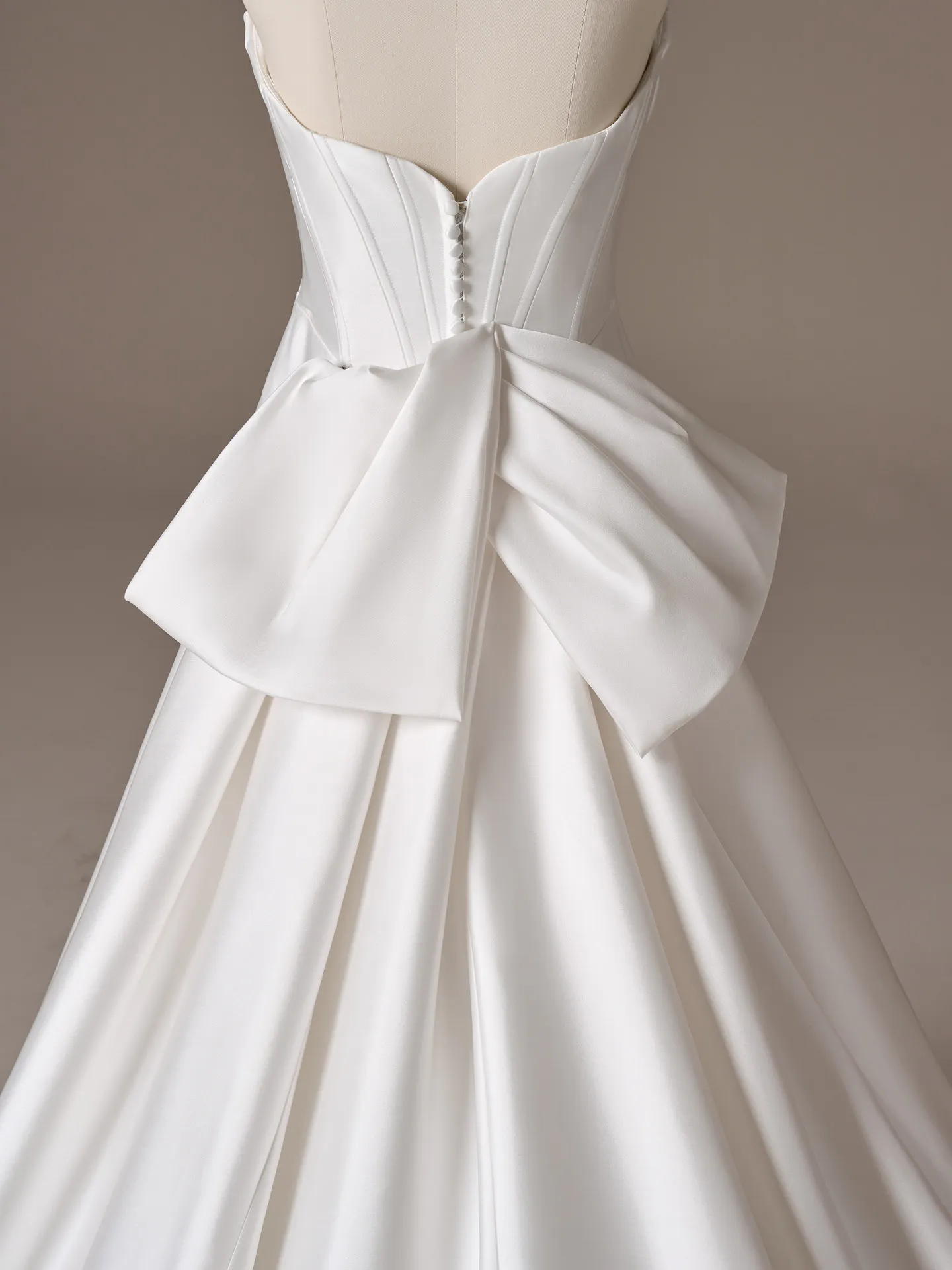 Maggie Sottero Melissa fit and flare wedding dress back view with sweeping train