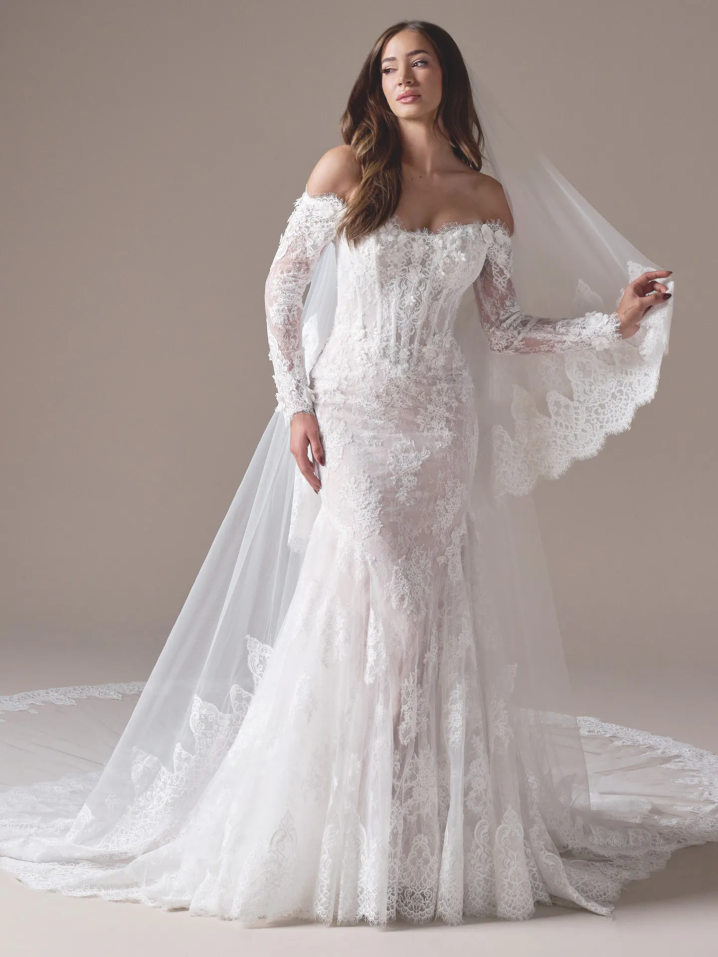Maggie Sottero Takera fit and flare wedding dress back view with long train