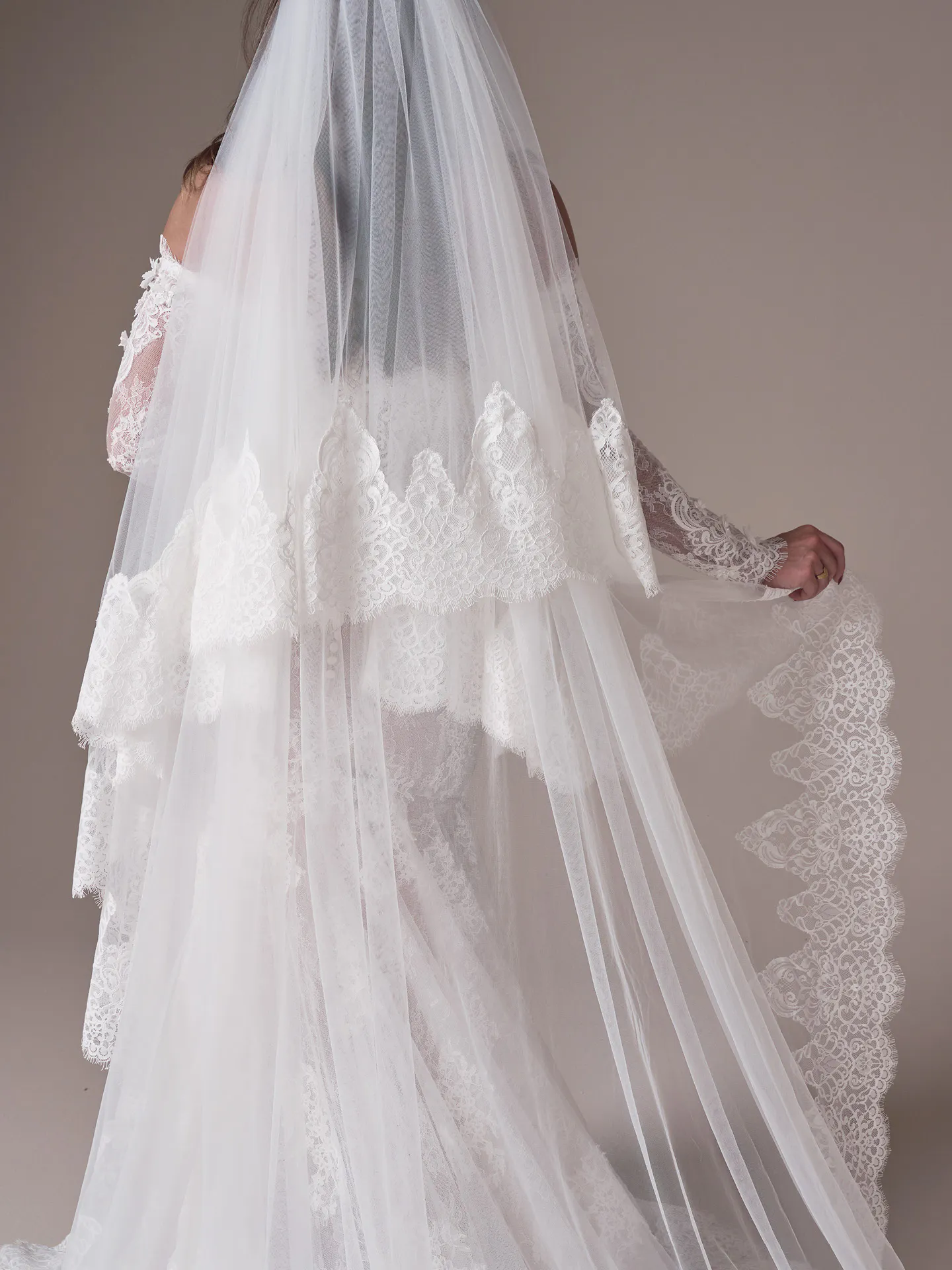 Maggie Sottero Takera fit and flare wedding dress side profile with sleek contour