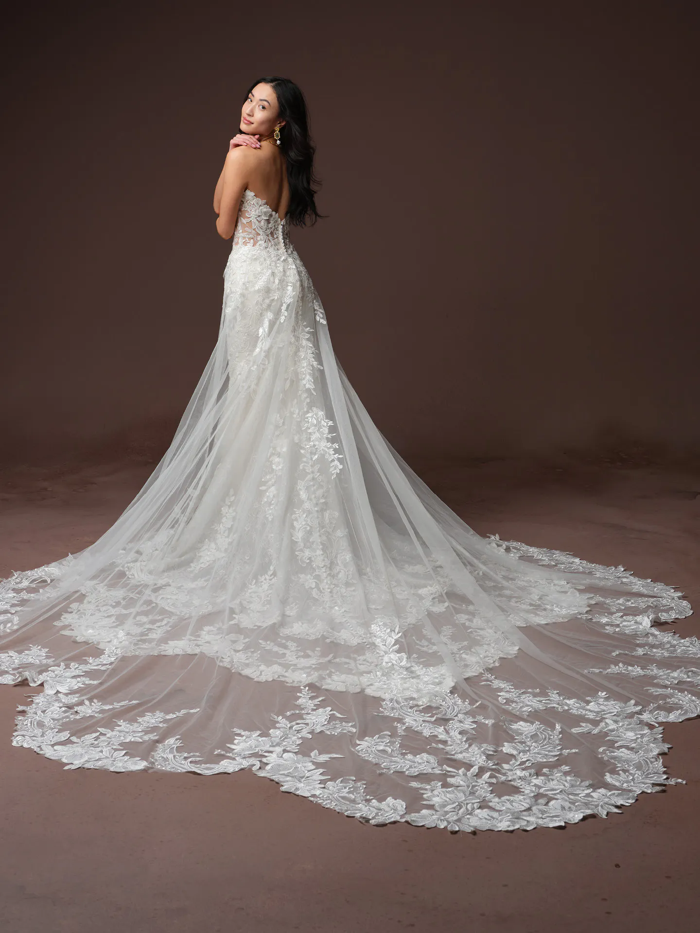 Maggie Sottero Adrian back view lace scalloped train