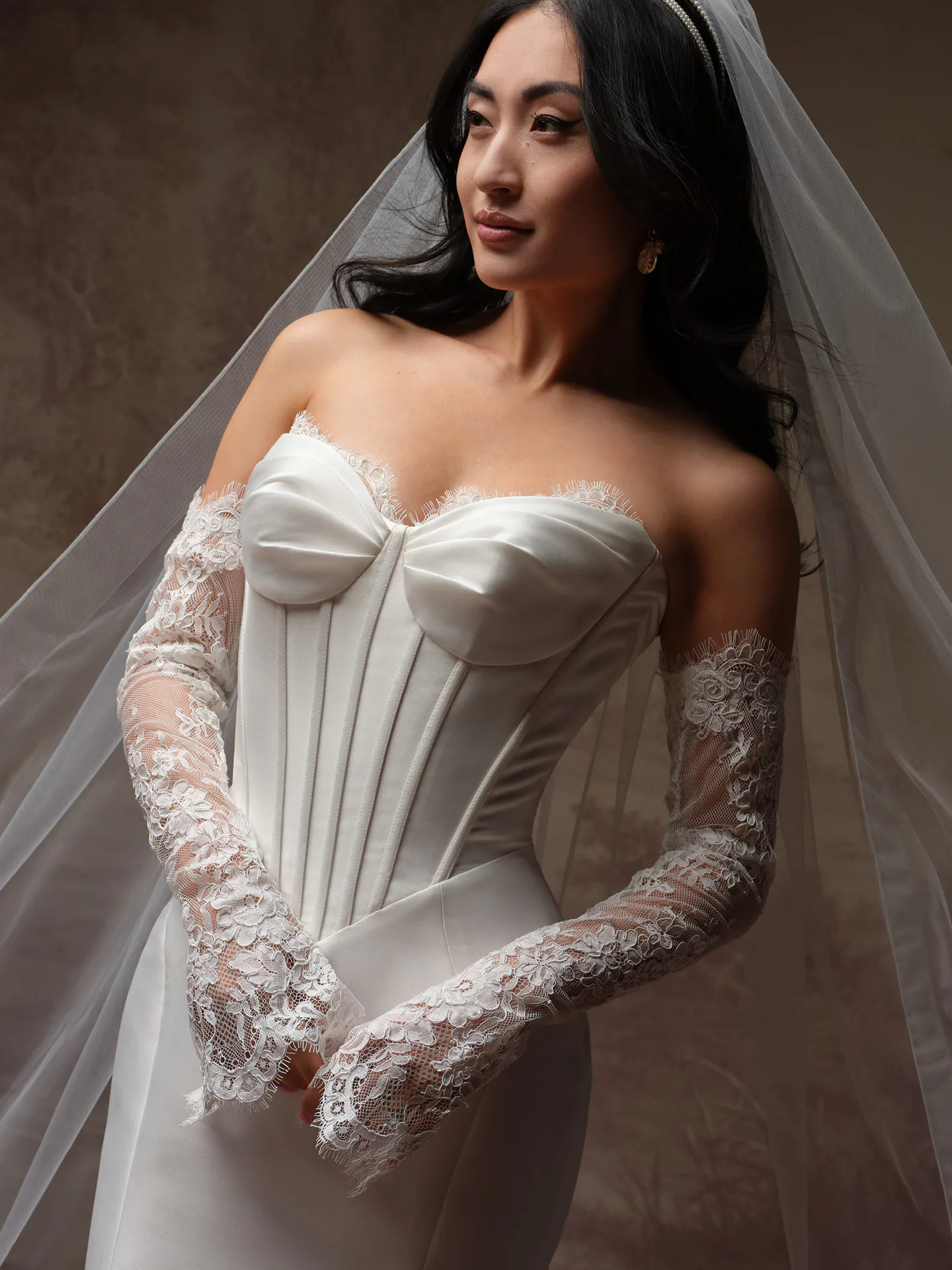 Rebecca Ingram Zorina front view with corded lace sleeves and flared cuffs