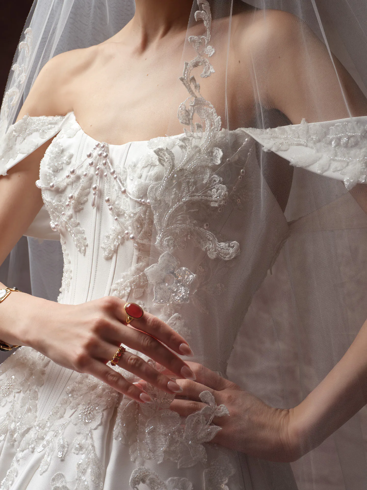 Sottero and Midgley dress with beaded lace and Burke Royal veil detail.